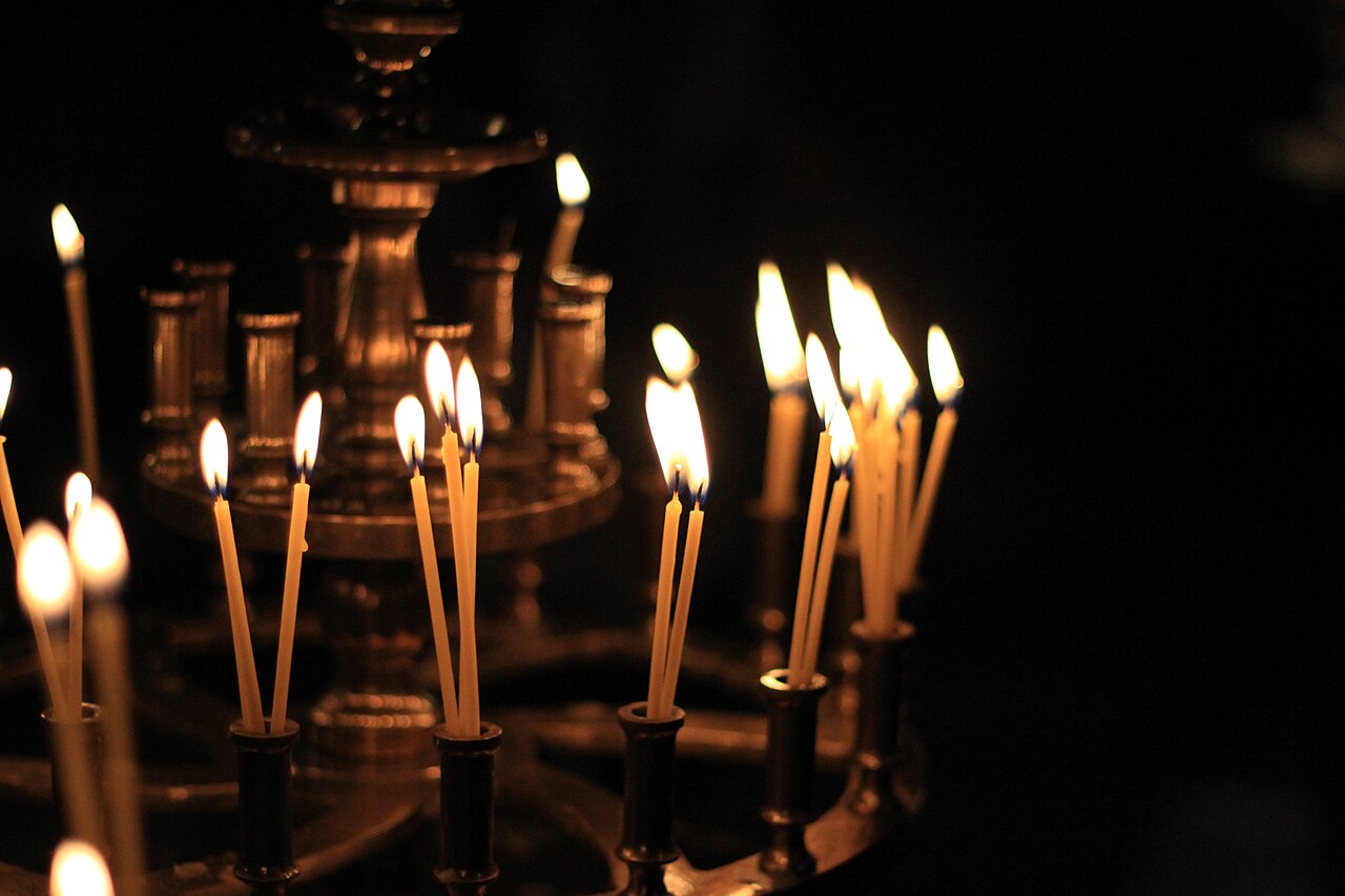 Memorial candles in a Bulgarian Orthodox church, lit in remembrance of the deceased
